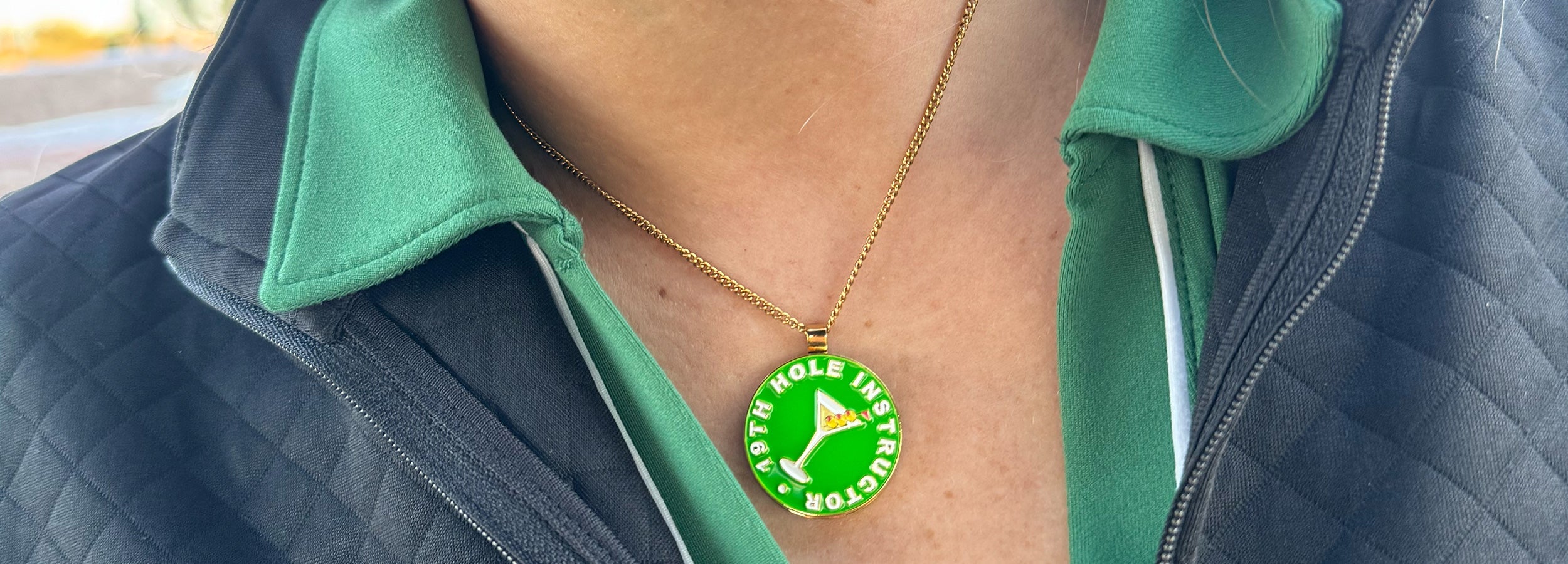 Woman Golfer wearing Birdie Girl 19th hole instructor Ball Marker Necklace