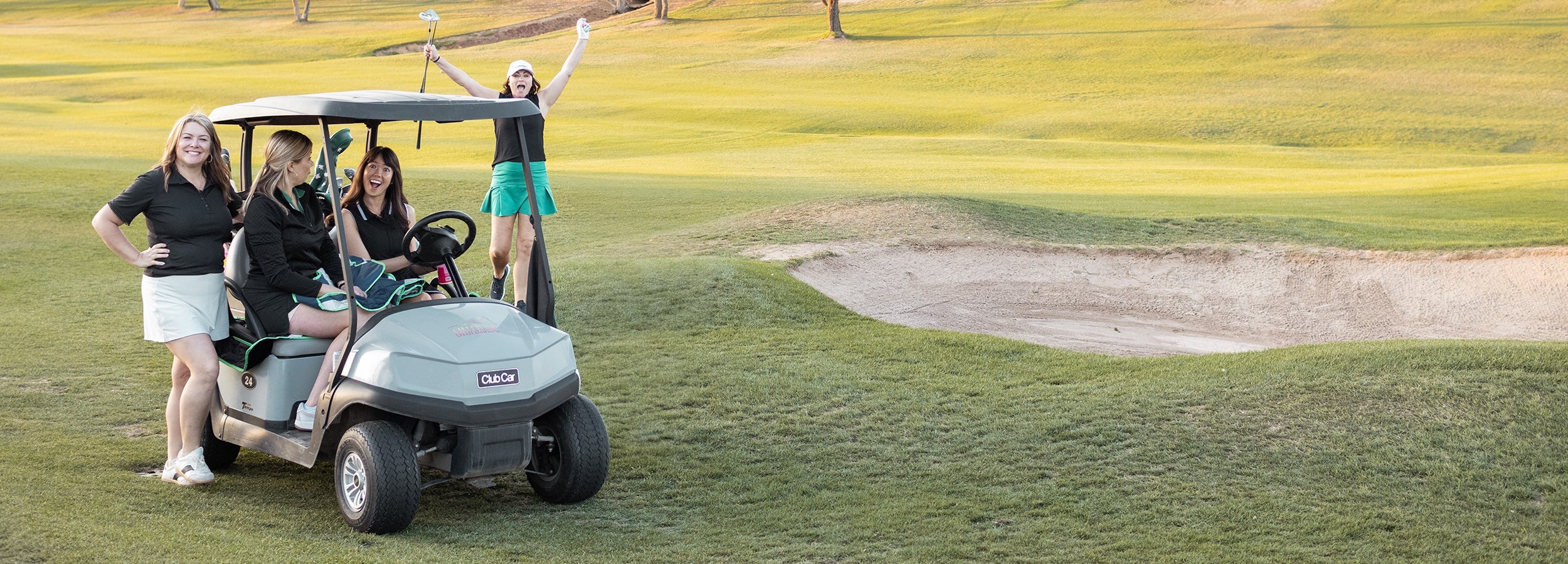 Birdie Girl Golfers with Golf Cart on Course