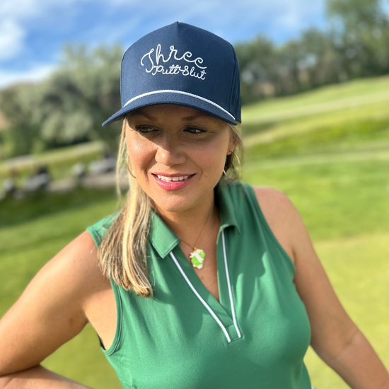 women wearing three putt slut hat