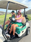 Ladies riding with a golf cart seat cover