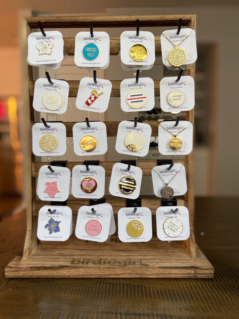 Retail Display showcasing birdie girl golf ball markers